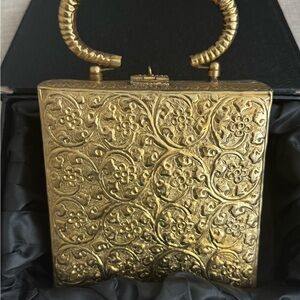 Elegant Gold Embossed Handbag
